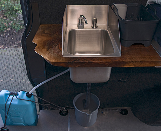 Sink with drying rack and hand pump from jerry can